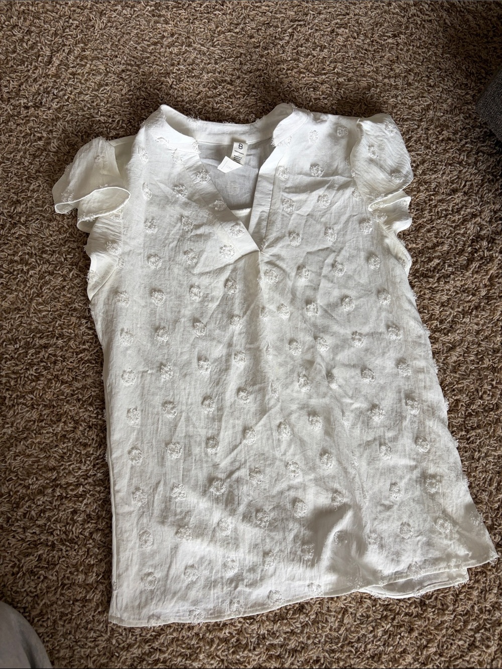 White flowy top